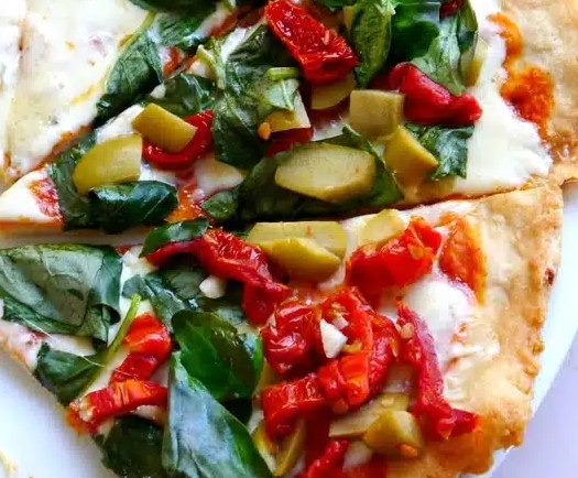 Pizza de queso y vegetales (especialidad vegetarianos)